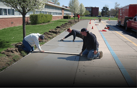 Concrete sidewalk installation by Adams Asphalt & Construction in Kent, WA