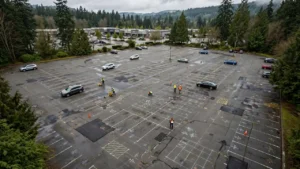 Aerial view of a commercial parking lot during a pavement condition assessment